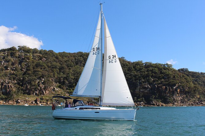 3-Hour Private Skippered Sailing Yacht Charter in Palm Beach - Portuguese Beach swim stop: an easy anchor for sand time and snorkel