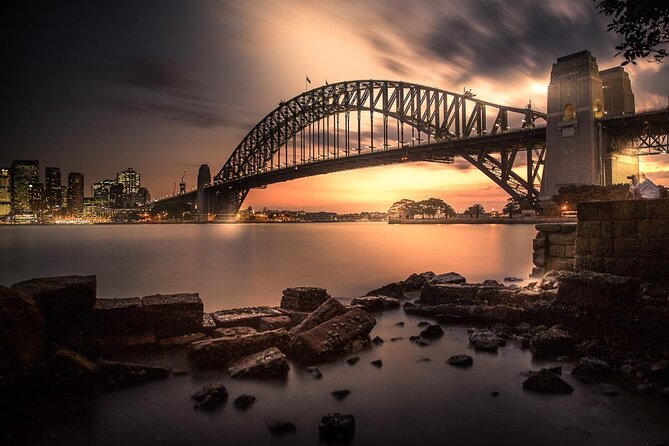 Private Sydney Harbour Sunset Photo Tour & Cruise - Milsons Point: the Bridge arch above you, Opera House glowing to the left
