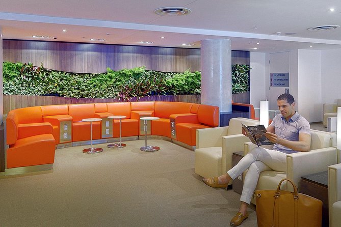 Sydney Airport Plaza Premium Lounge - The Lounge Layout: Window Views, Botanical Wall, and Seating for 140