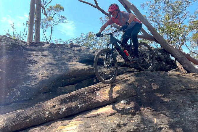 Sydney Electric Mountain Bike Guided Tour - E-bike setup: hardtail vs dual suspension, plus helmets and protective gear